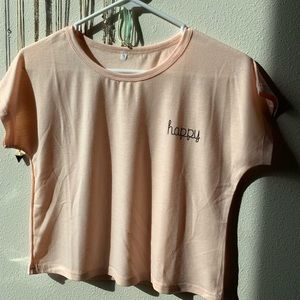 Soft pink crop top.